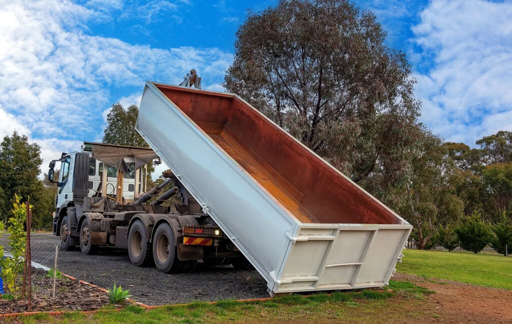 Roll-off dumpster delivery in Lakeland, FL for residential renovation and roofing debris removal